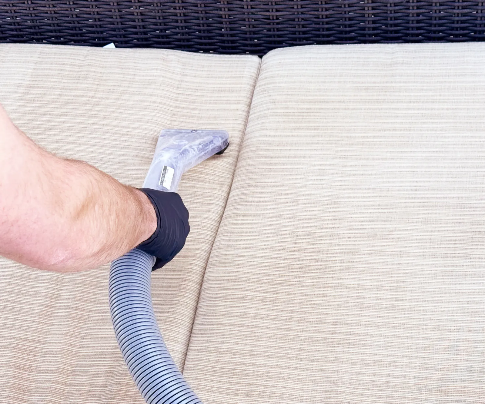 outdoor couch cushions being cleaned